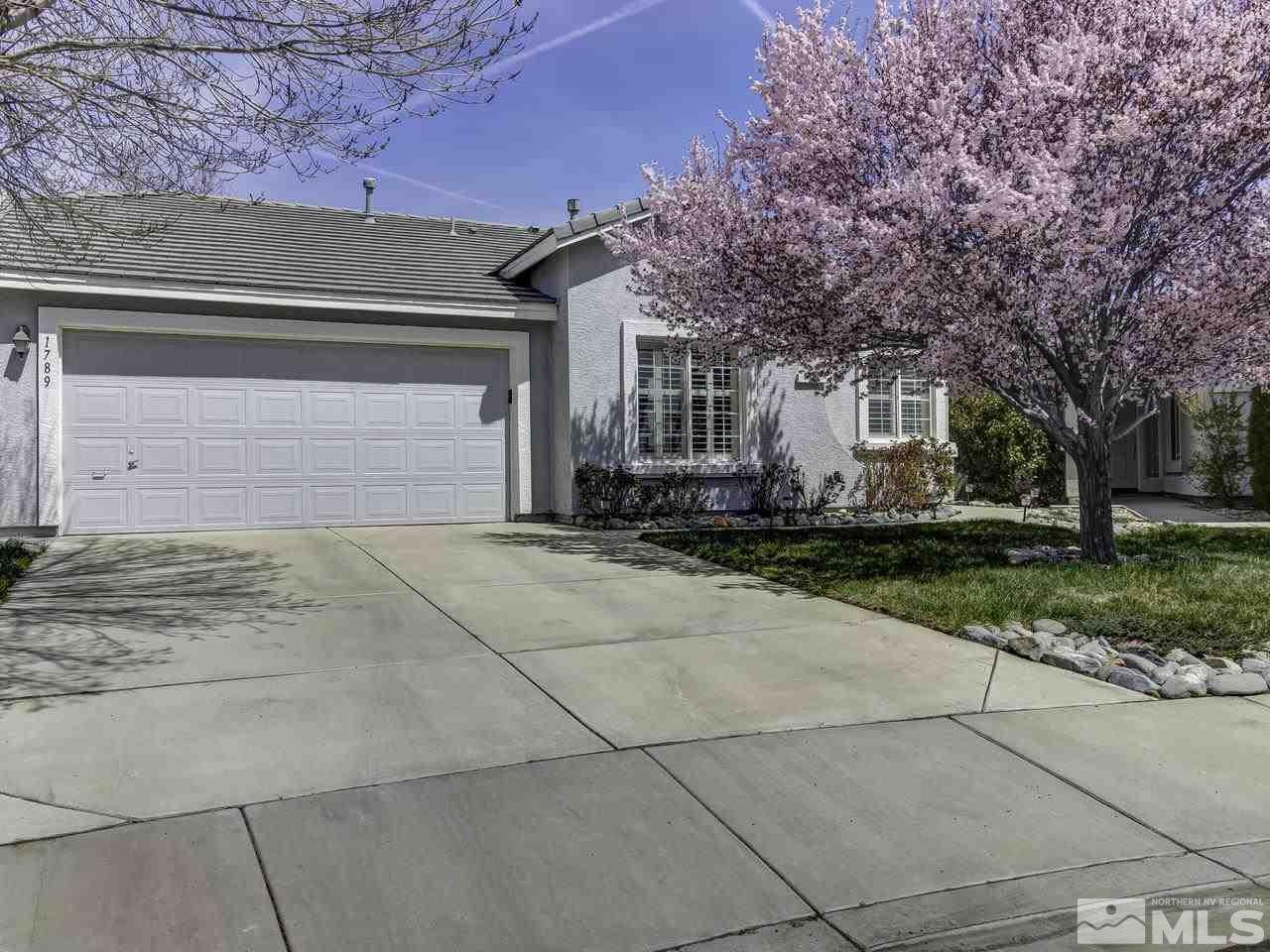 1789 River Gorge Drive Reno, NV 89521 - Photo 1 of 24 a front view of a house with a yard