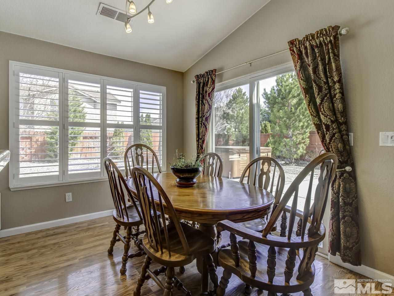 1789 River Gorge Drive Reno, NV 89521 - Photo 11 of 24 a view of a dining room with furniture window and outside view