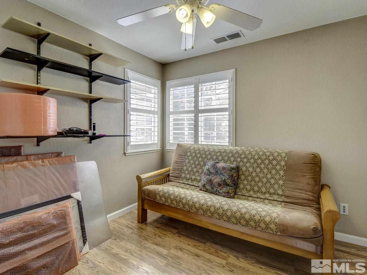 1789 River Gorge Drive Reno, NV 89521 - Photo 15 of 24 a living room with furniture and a large window
