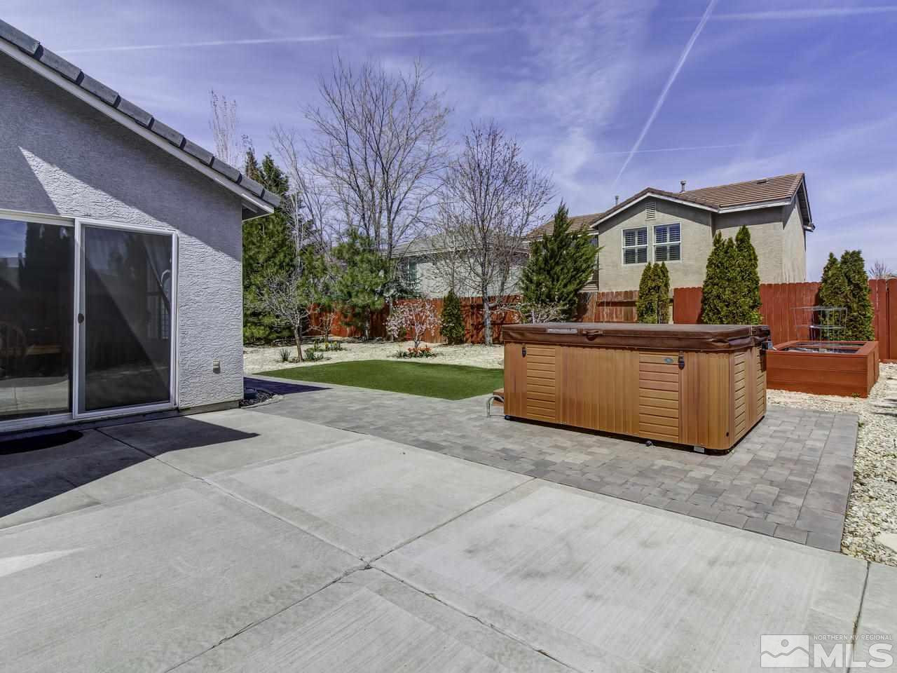 1789 River Gorge Drive Reno, NV 89521 - Photo 20 of 24 a view of a house with outdoor kitchen in front of it