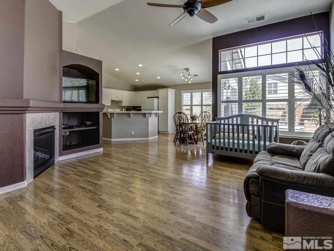 1789 River Gorge Drive Reno, NV 89521 - Photo 2 of 24 a living room with furniture and a fireplace