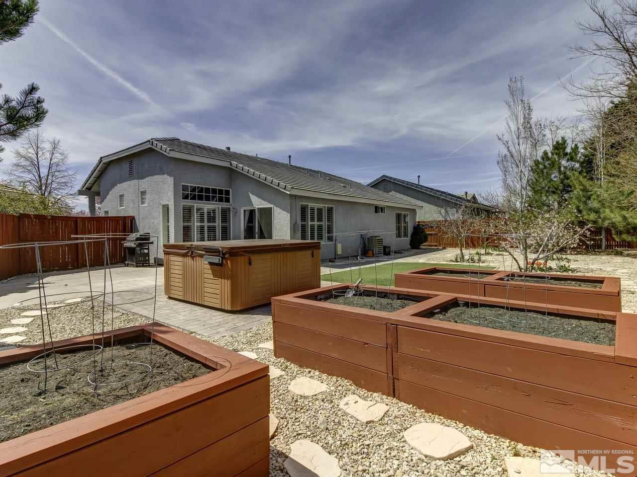 1789 River Gorge Drive Reno, NV 89521 - Photo 21 of 24 a front view of a house with balcony