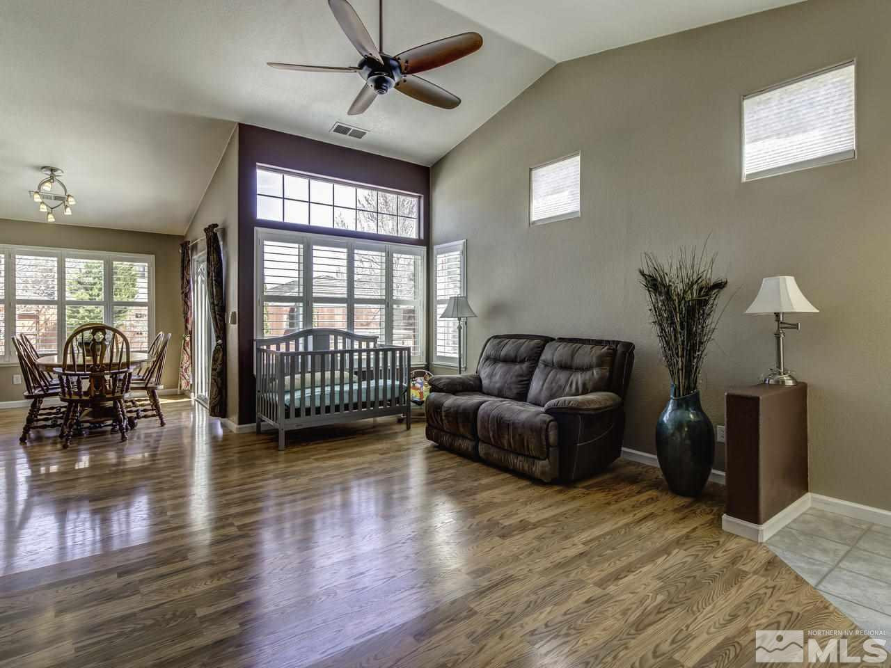 1789 River Gorge Drive Reno, NV 89521 - Photo 3 of 24 a living room with furniture and a large window