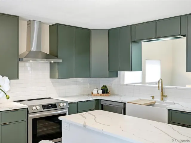 a kitchen with cabinets and white appliances