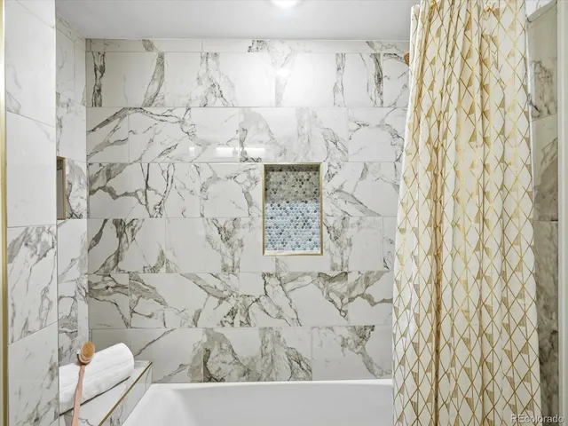 a bathroom with a shower curtain