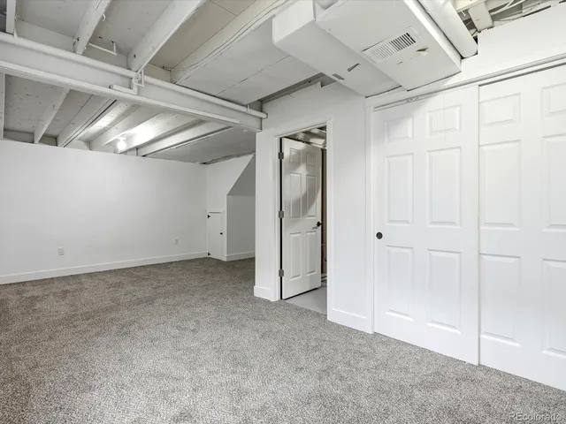 a view of a room with an empty space