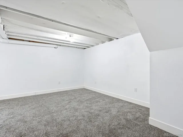 a view of a room with an empty space