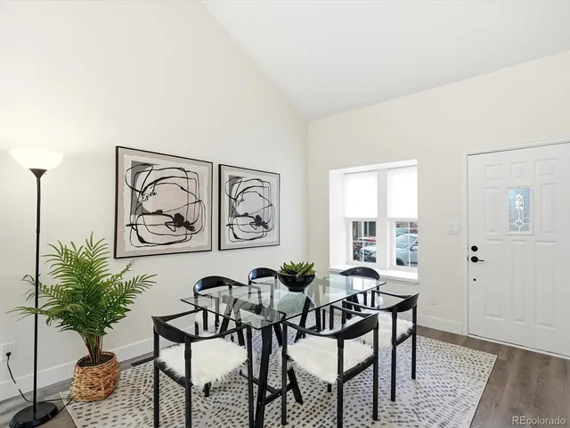 a view of a livingroom with furniture and window