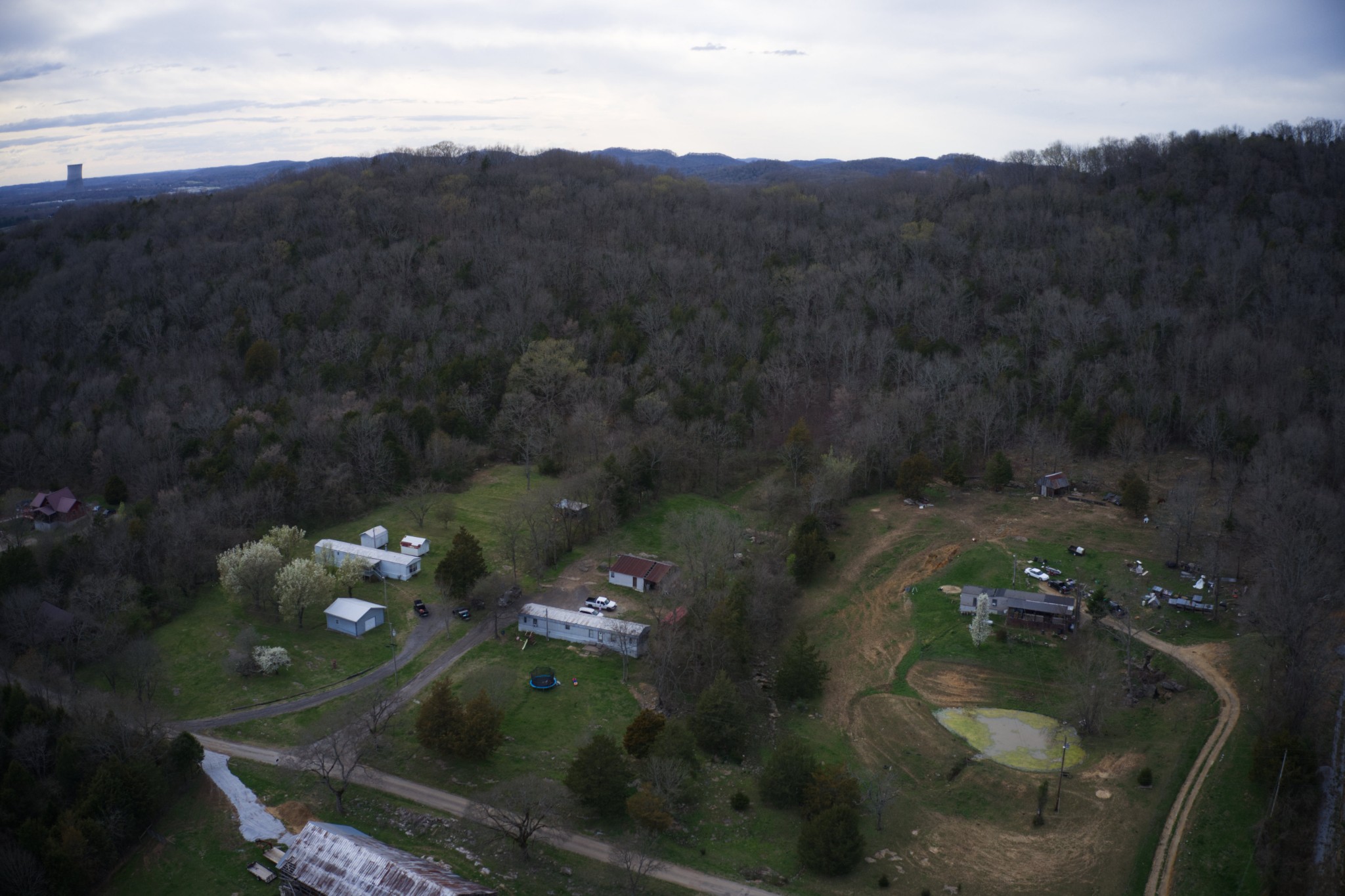 163 Wilburn Hollow Road Riddleton, TN 37151 - Photo 7 of 10 an aerial view of a house with lots of trees