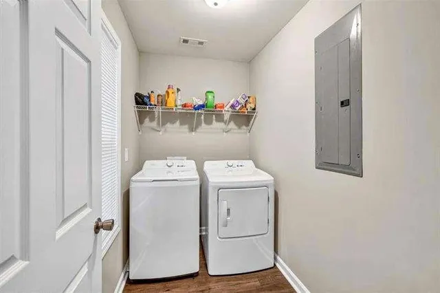 a utility room with dryer and washer