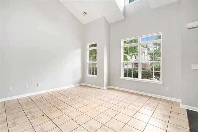 a view of an empty room and window