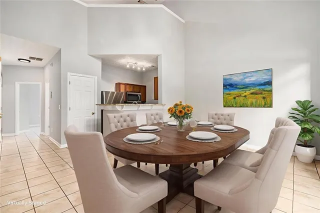 a view of a dining room with furniture