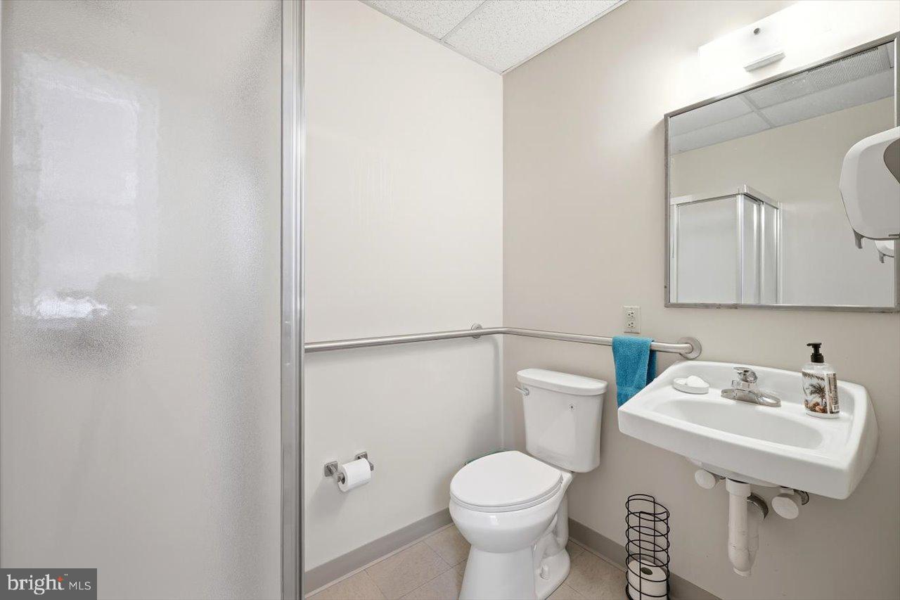 38 Cherry Grove Road Middlebrook, VA 24459 - Photo 21 of 31 a bathroom with a sink toilet and a mirror