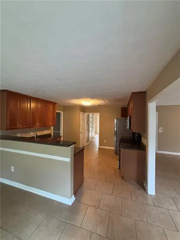 a kitchen with a cabinets and counter space