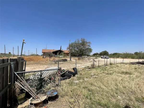 a view of a roof deck with a patio