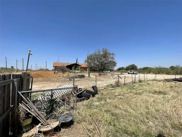 a view of a roof deck with a patio
