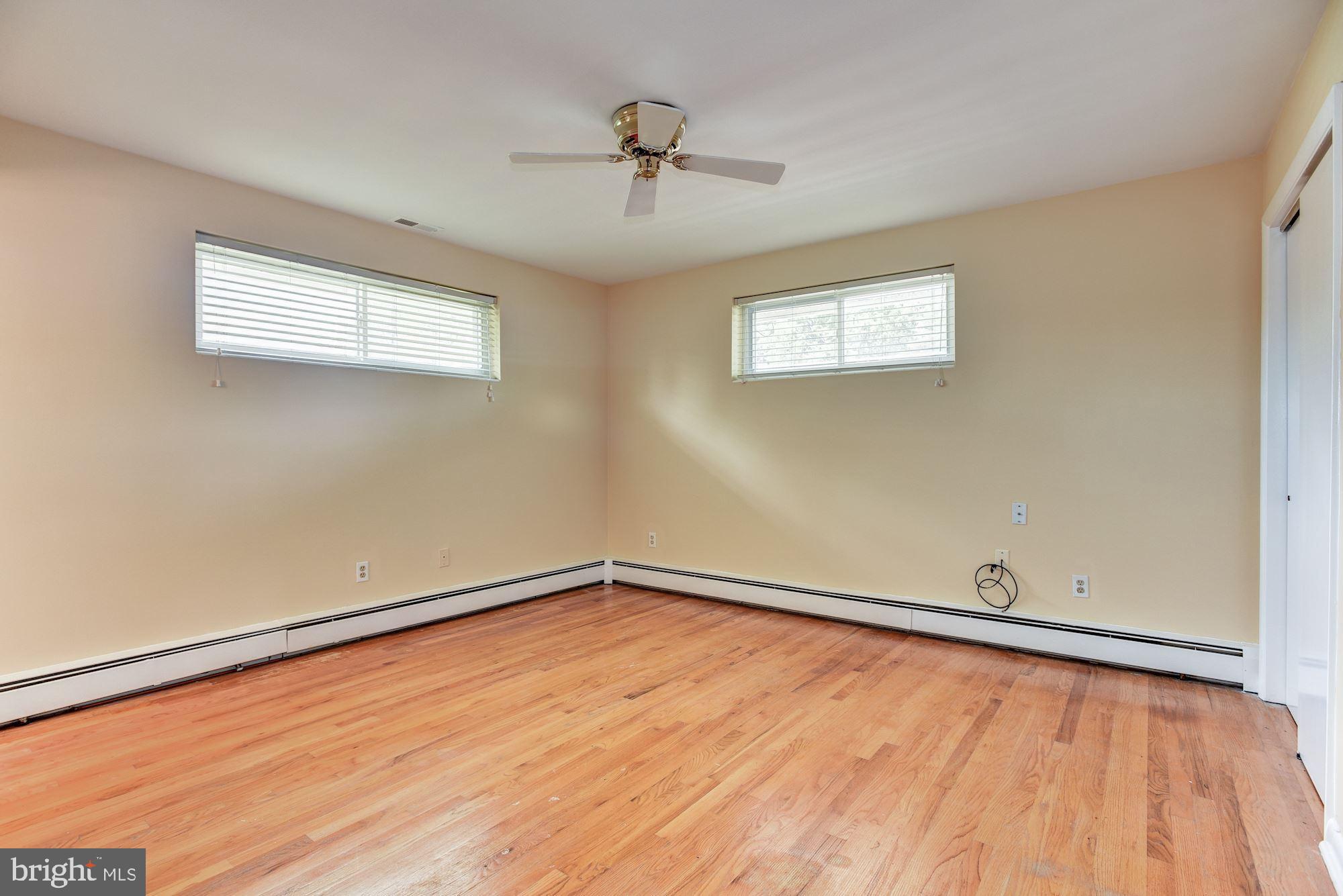 8492 Laurel Road Pasadena, MD 21122 - Photo 15 of 46 a view of an empty room with a window