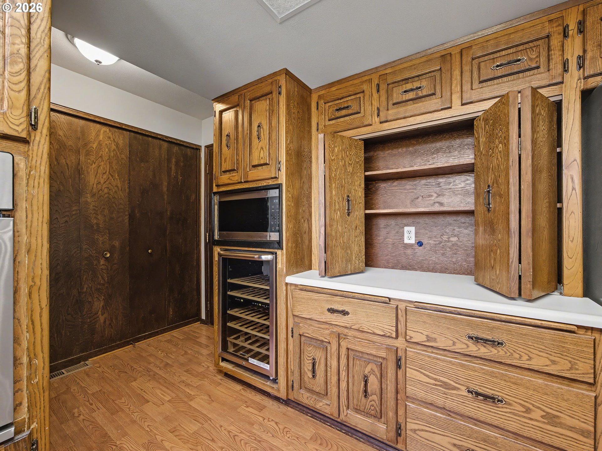 407 Southwest 7th Street Gresham, OR 97080 - Photo 13 of 48 a bedroom with cabinets and walk in closet