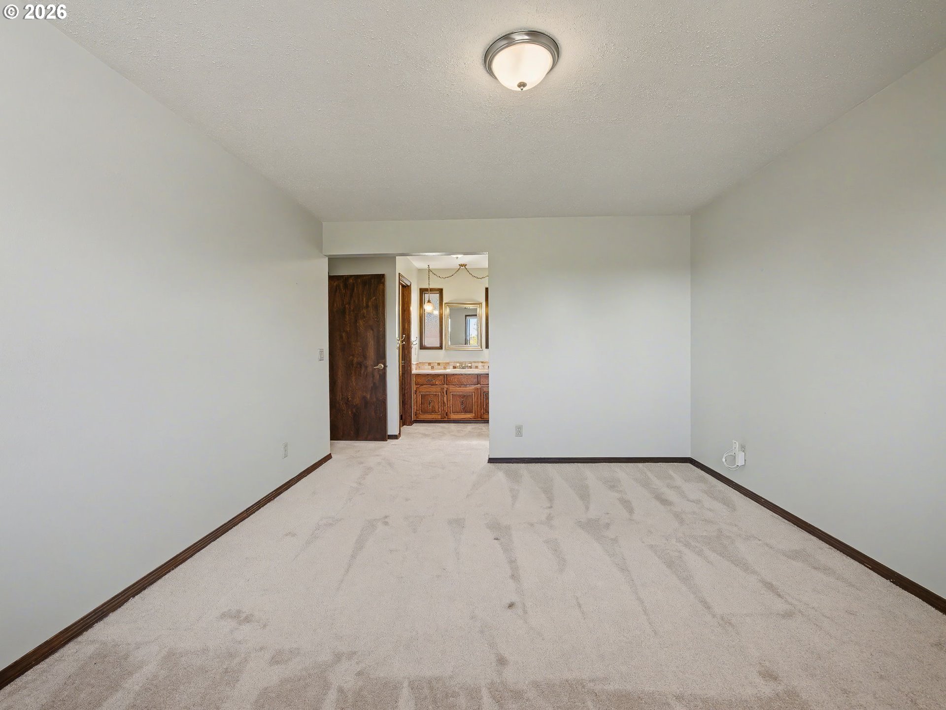 407 Southwest 7th Street Gresham, OR 97080 - Photo 15 of 48 an empty room with an empty space and windows