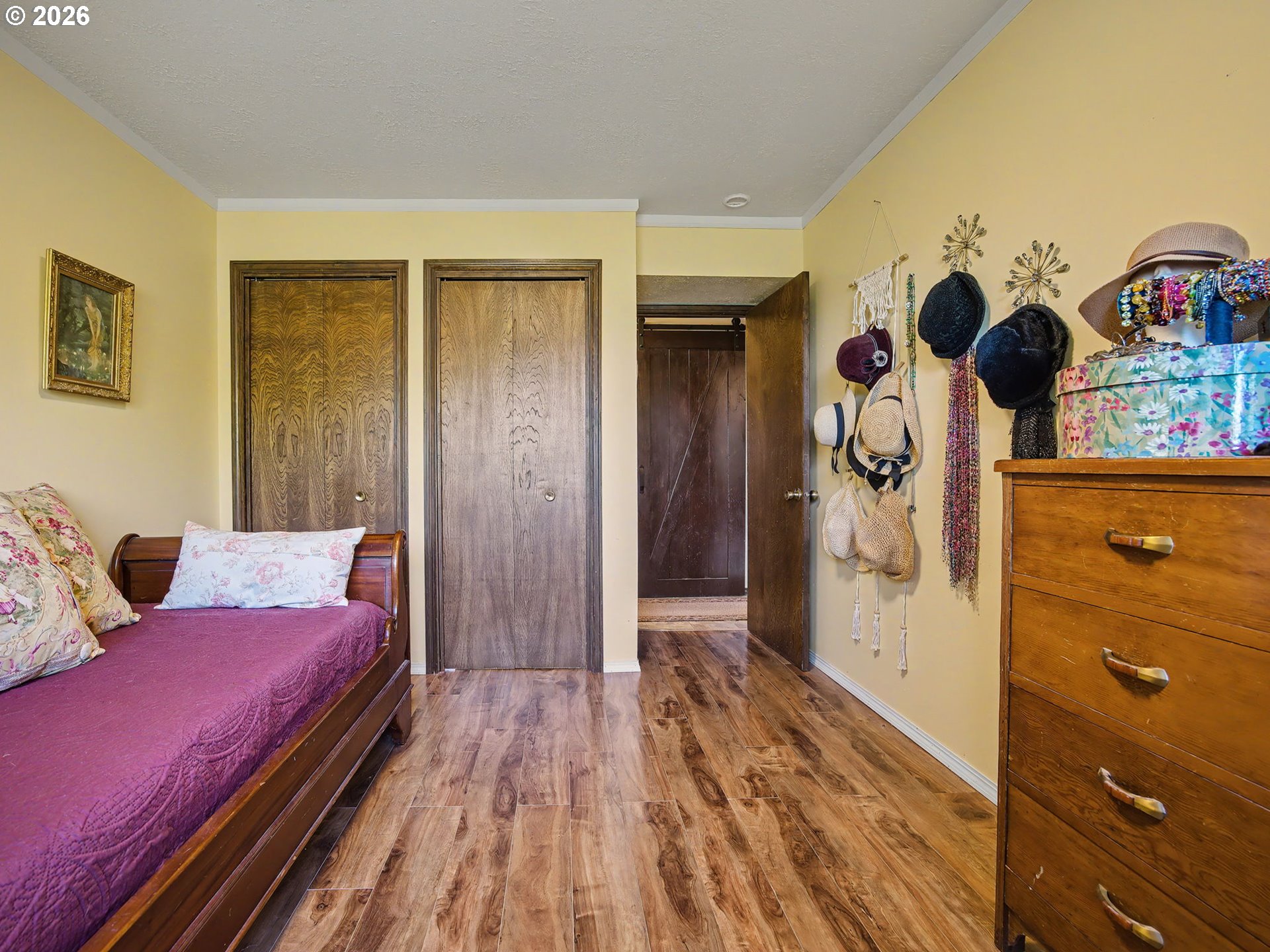 407 Southwest 7th Street Gresham, OR 97080 - Photo 18 of 48 a bedroom with a bed and a dresser