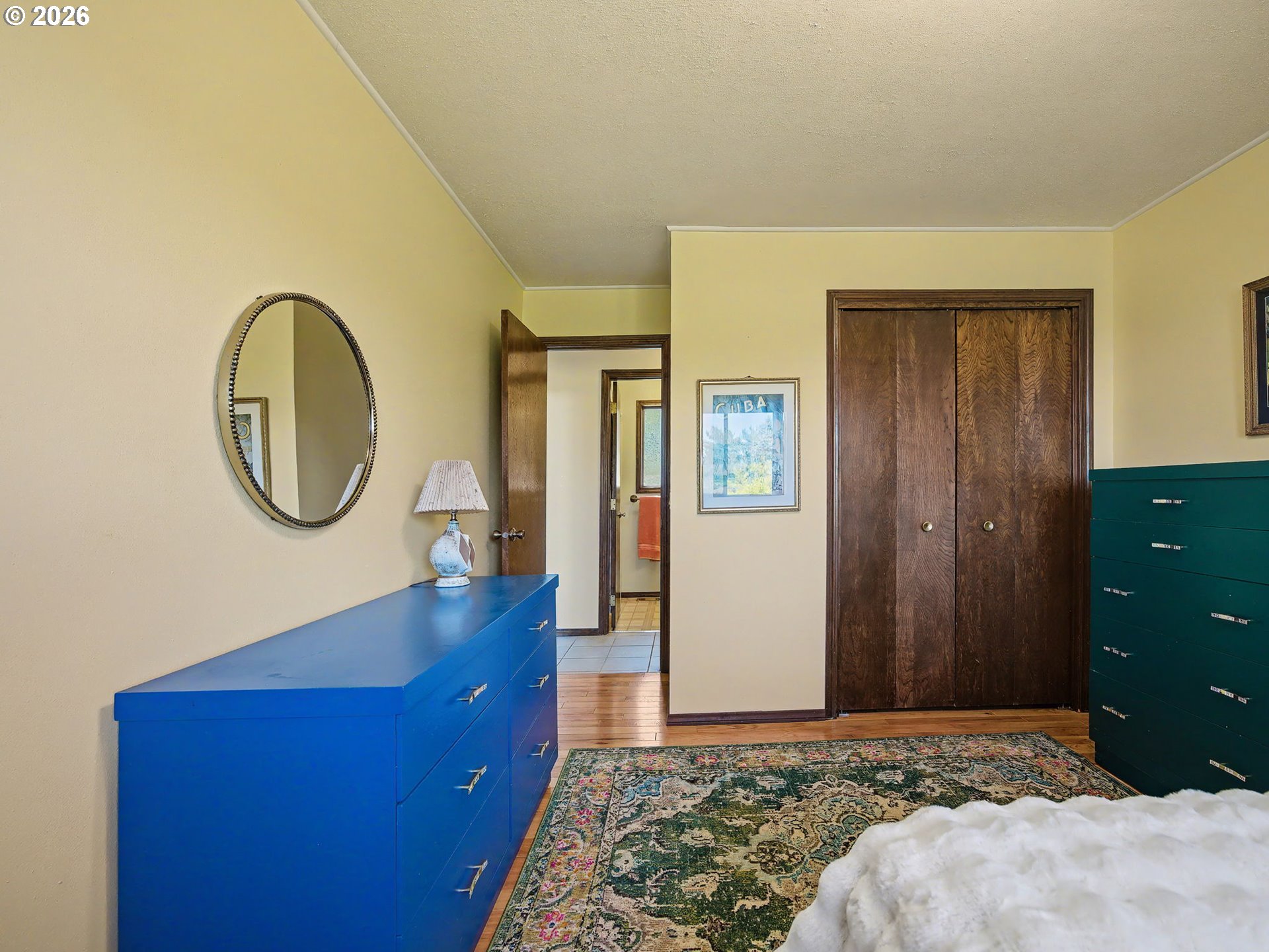407 Southwest 7th Street Gresham, OR 97080 - Photo 33 of 48 a bedroom with a bed and a dresser
