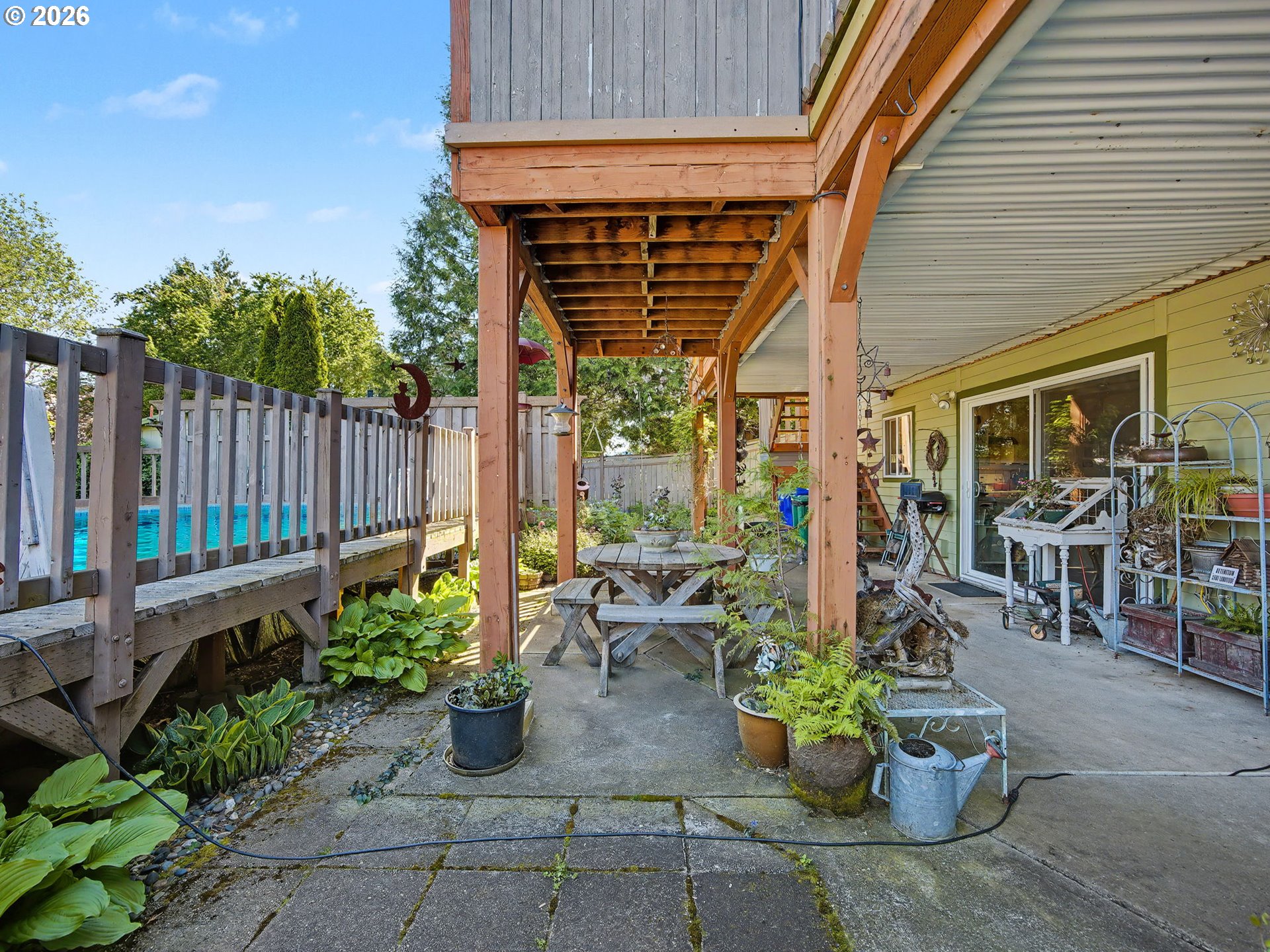 407 Southwest 7th Street Gresham, OR 97080 - Photo 39 of 48 a view of a patio with couches and potted plants