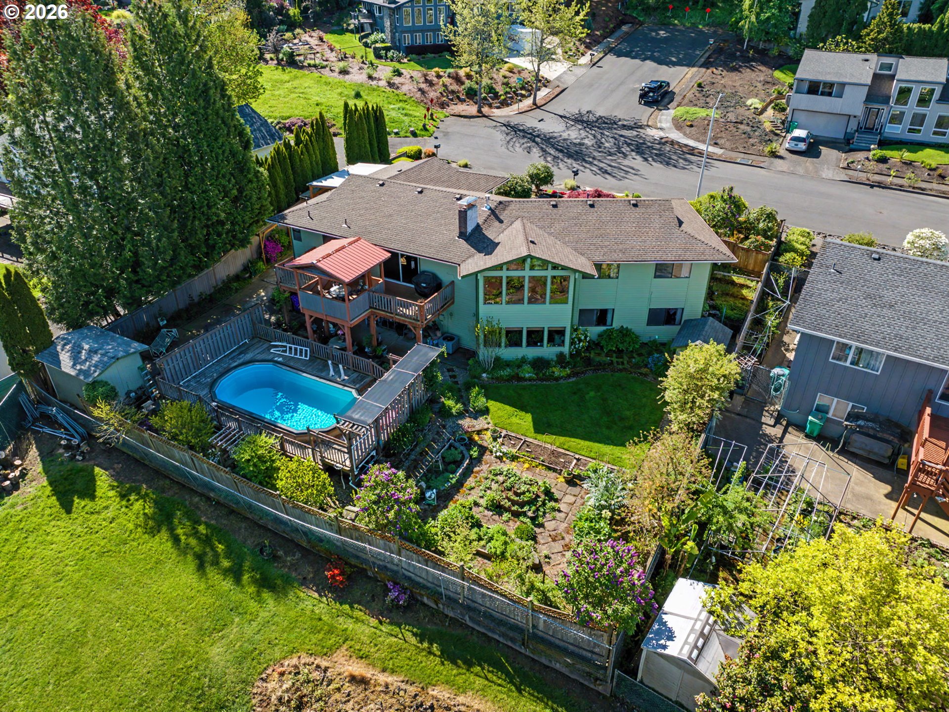 407 Southwest 7th Street Gresham, OR 97080 - Photo 44 of 48 an aerial view of a house with a garden and lake view