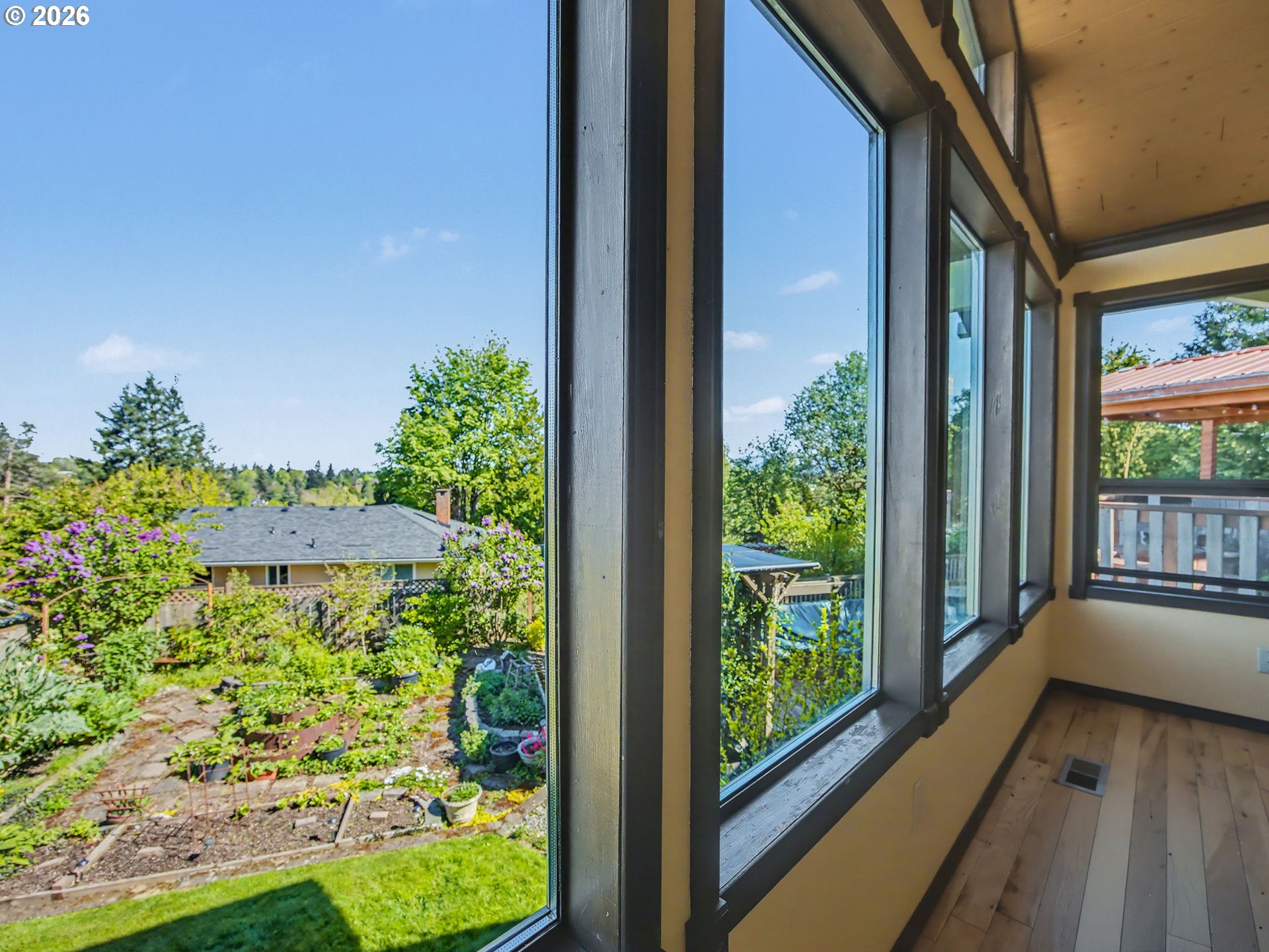 407 Southwest 7th Street Gresham, OR 97080 - Photo 5 of 48 a view of a garden from a balcony