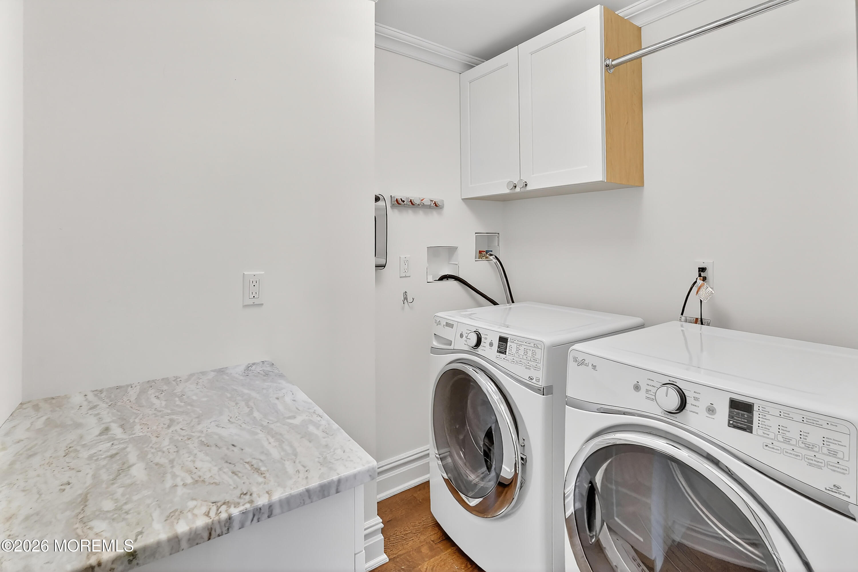 65 East River Road, Unit 20 Rumson, NJ 07760 - Photo 9 of 31 a utility room with dryer and washer