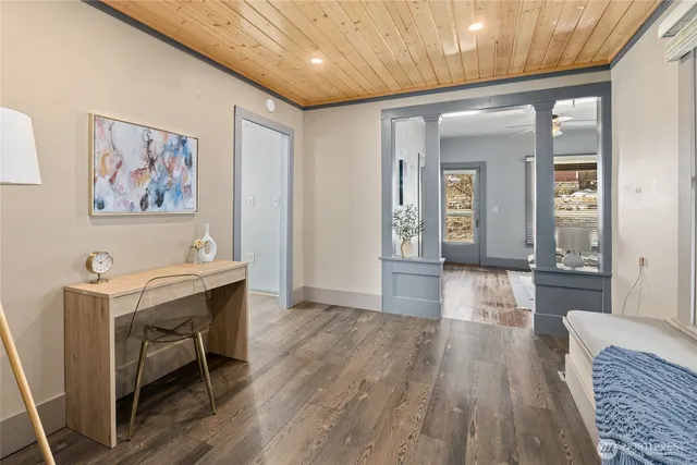a view of a livingroom with furniture and wooden floor