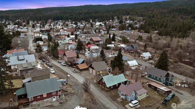 a view of a city with a lake