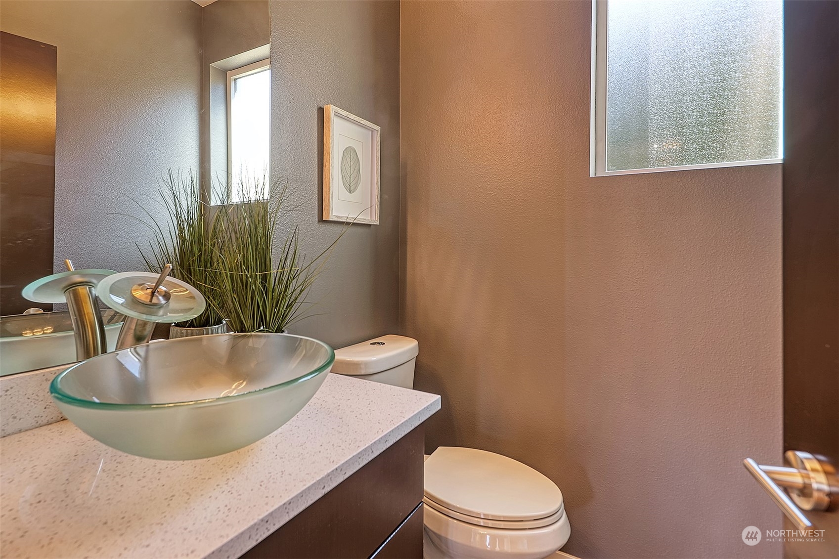 3263 35th Avenue Southwest Seattle, WA 98126 - Photo 12 of 38 a bathroom with a granite countertop sink and a mirror