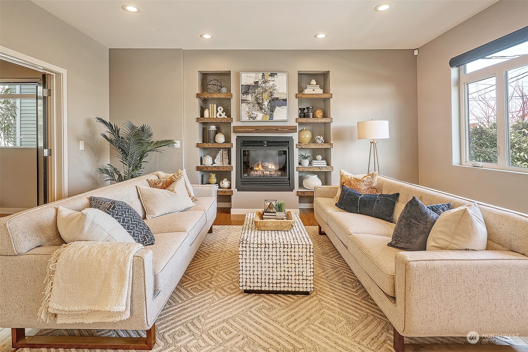 3263 35th Avenue Southwest Seattle, WA 98126 - Photo 14 of 38 a living room with furniture and a fireplace