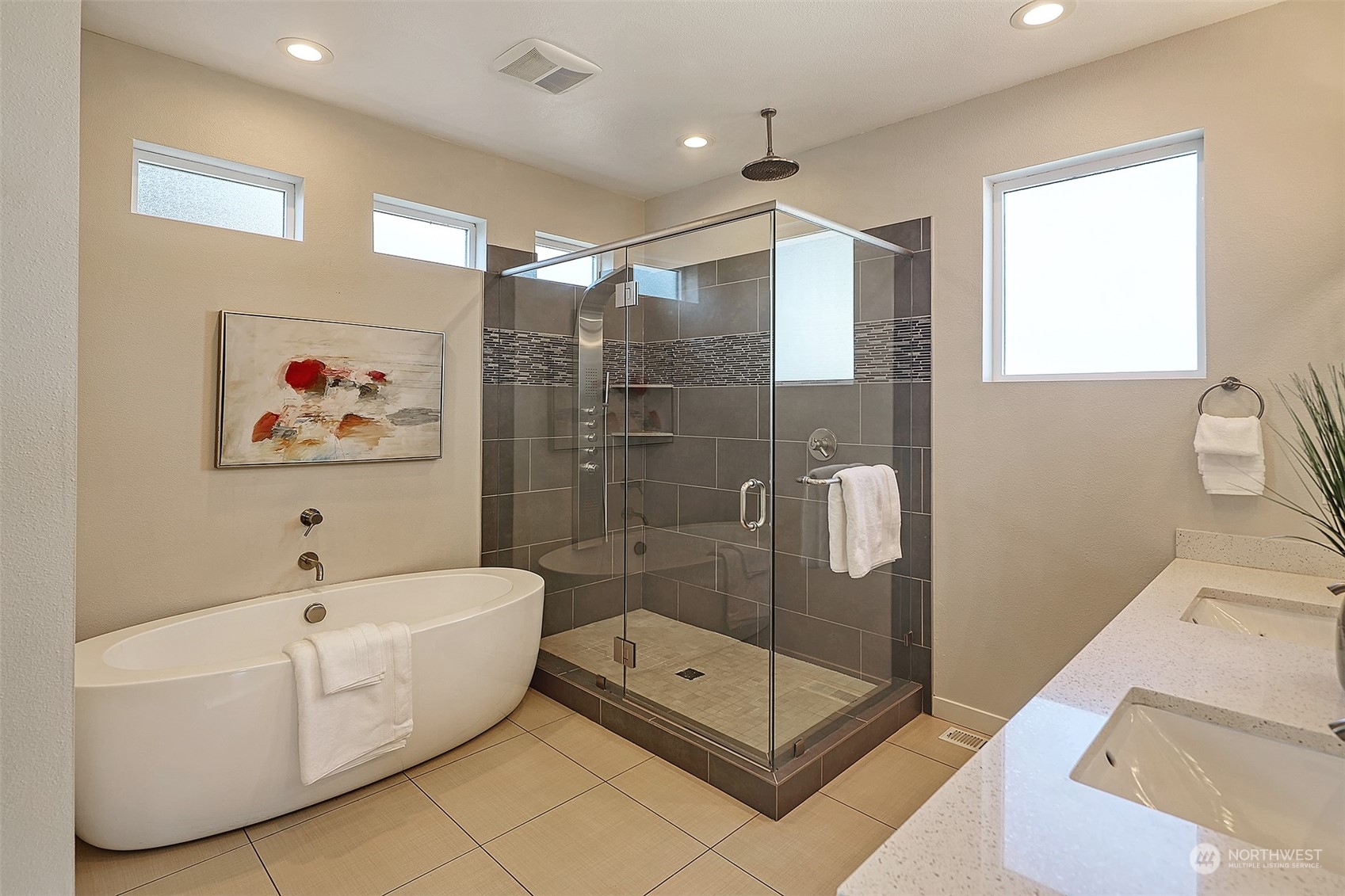 3263 35th Avenue Southwest Seattle, WA 98126 - Photo 20 of 38 a bathroom with a tub shower a mirror and a shower
