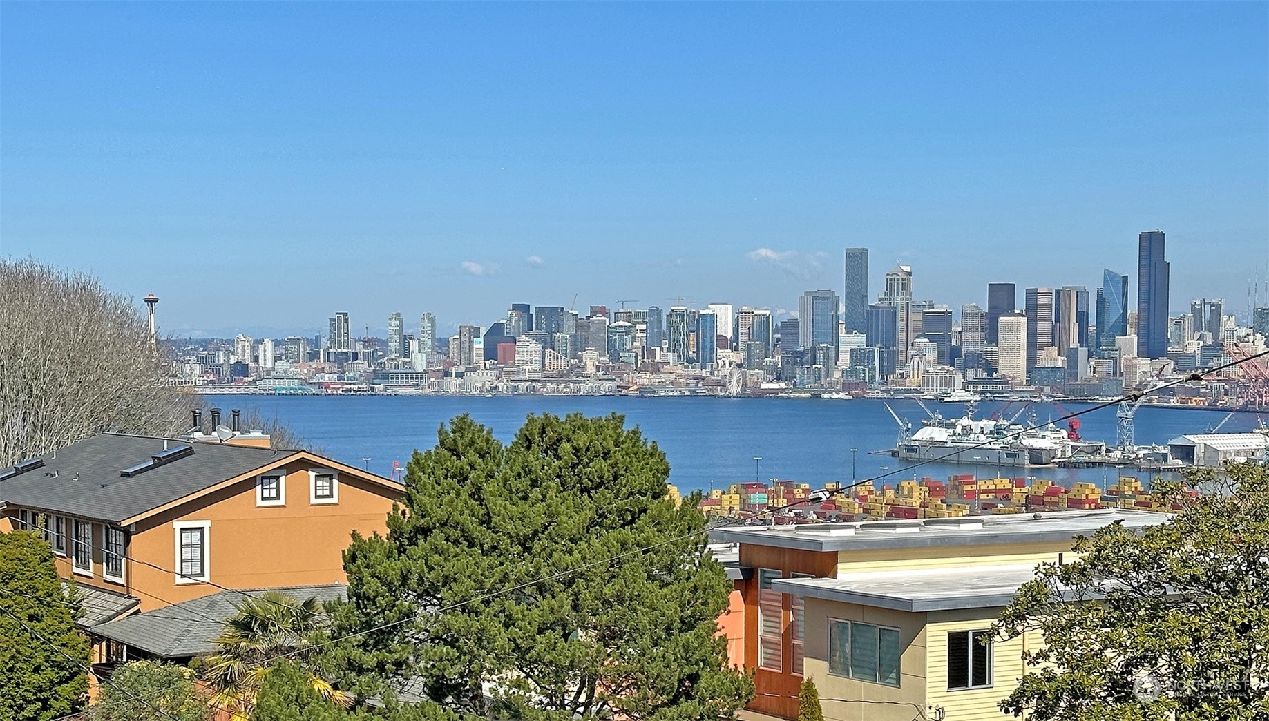 3263 35th Avenue Southwest Seattle, WA 98126 - Photo 2 of 38 a city view with tall buildings