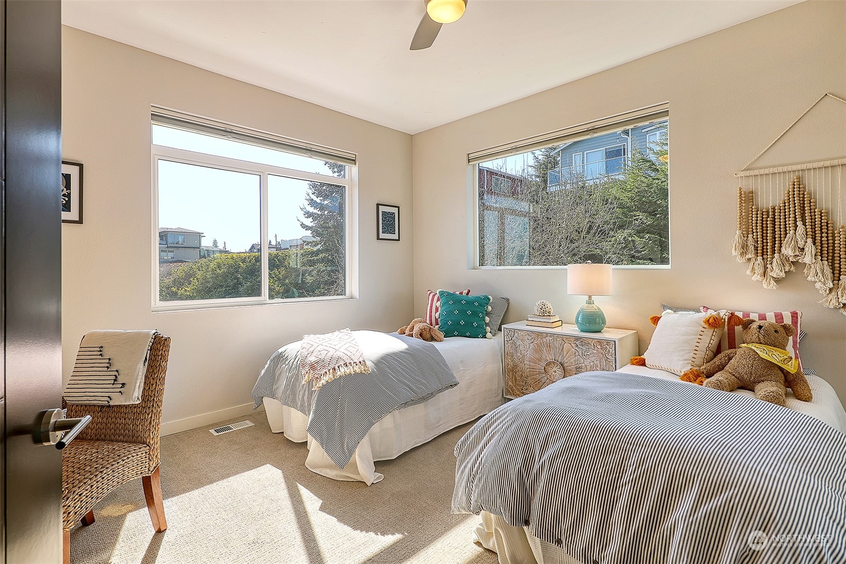 3263 35th Avenue Southwest Seattle, WA 98126 - Photo 24 of 38 a bedroom with two beds and a large window