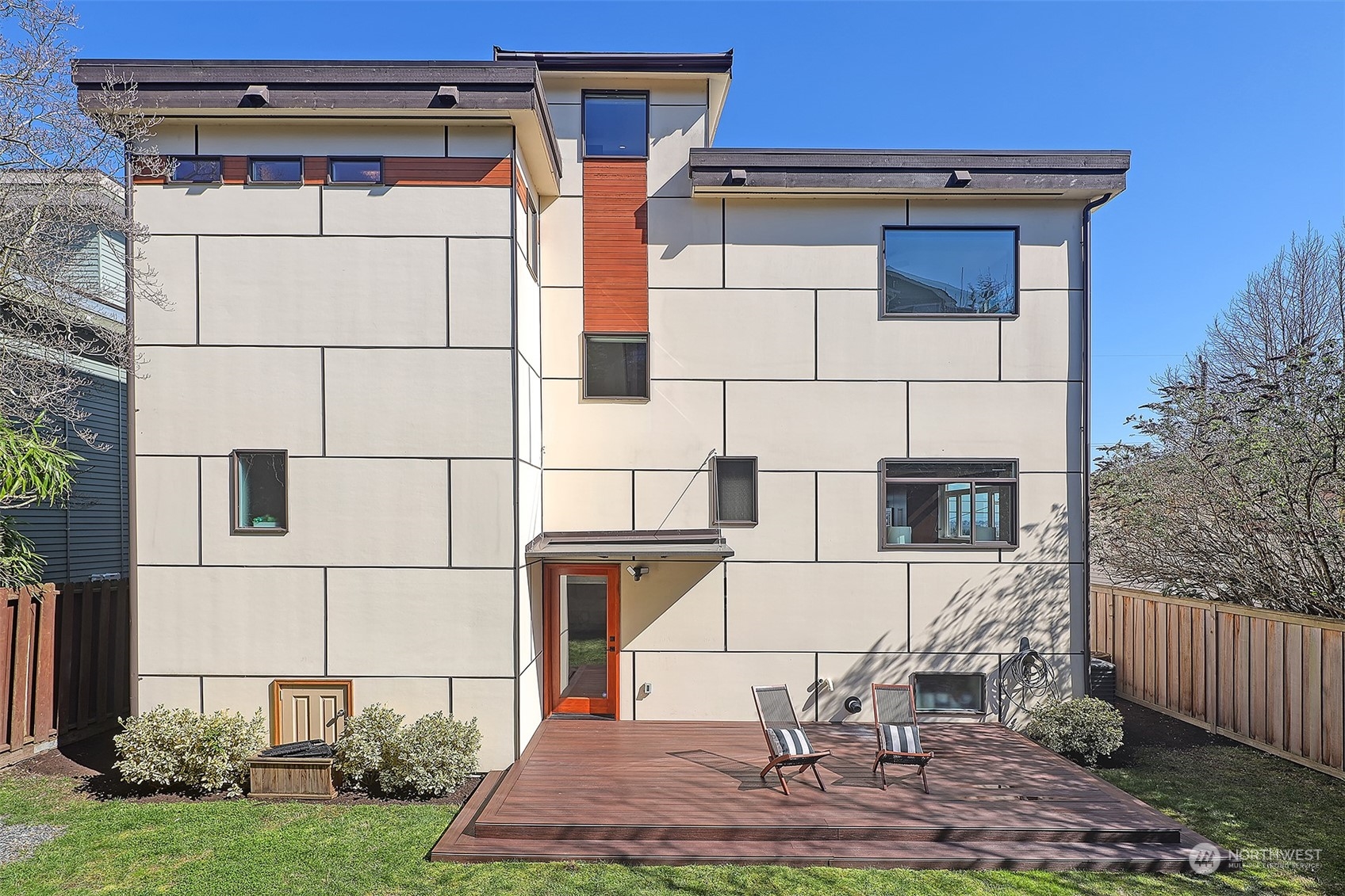 3263 35th Avenue Southwest Seattle, WA 98126 - Photo 32 of 38 a front view of a house with garden