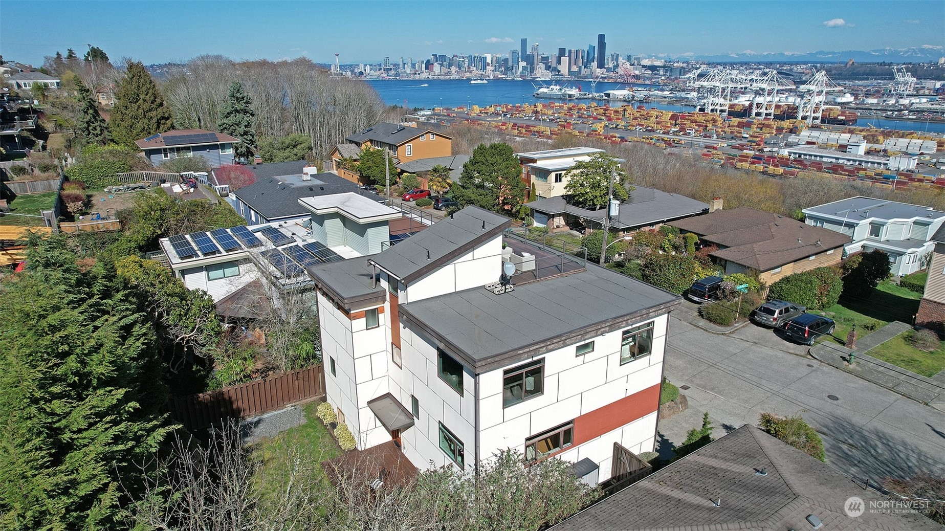 3263 35th Avenue Southwest Seattle, WA 98126 - Photo 36 of 38 an aerial view of a house with a ocean view