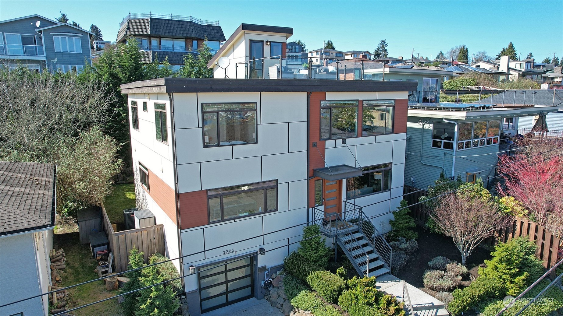 3263 35th Avenue Southwest Seattle, WA 98126 - Photo 37 of 38 a view of a house with yard and sitting area
