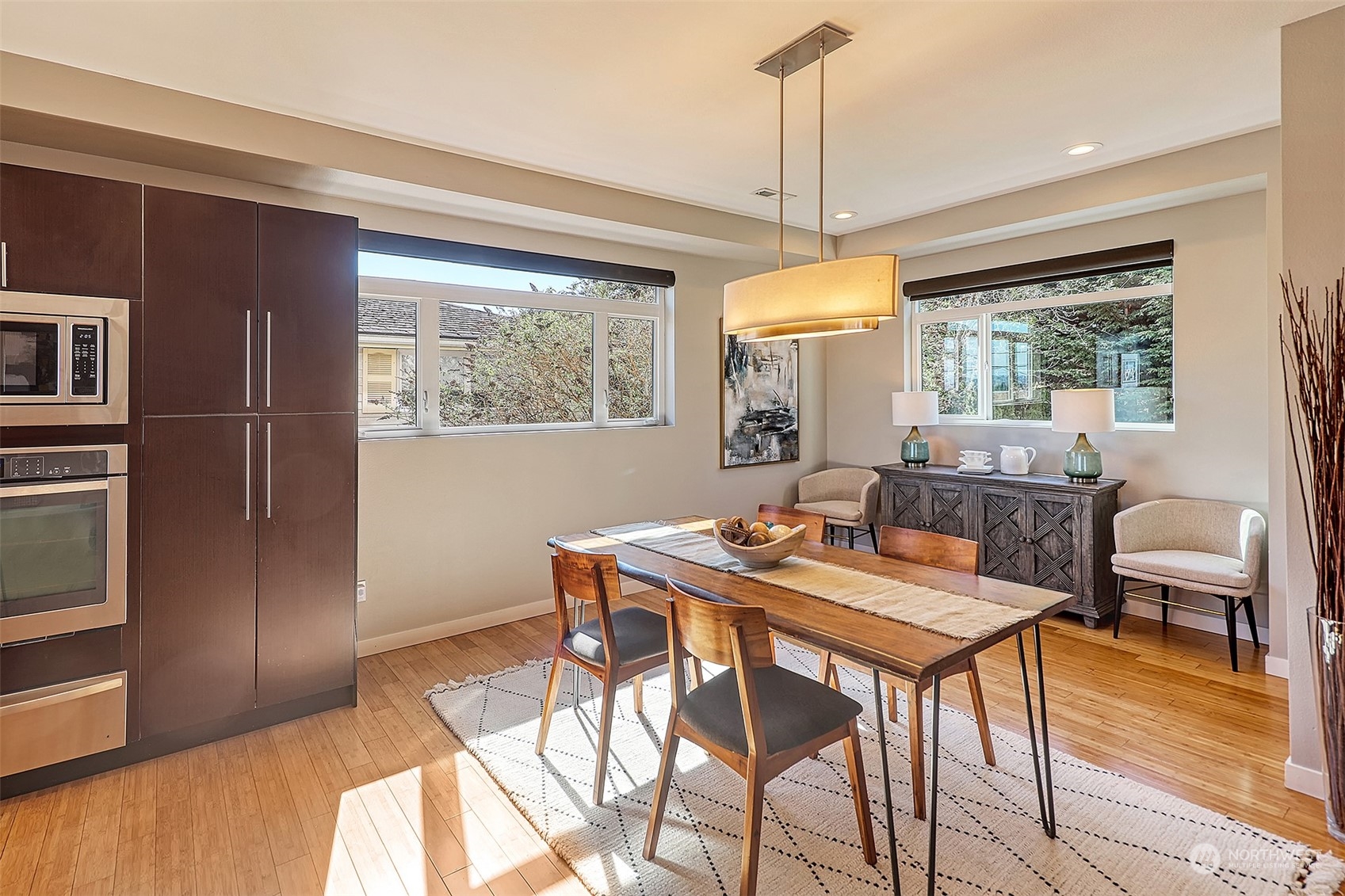 3263 35th Avenue Southwest Seattle, WA 98126 - Photo 9 of 38 a view of a dining room with furniture window and outside view