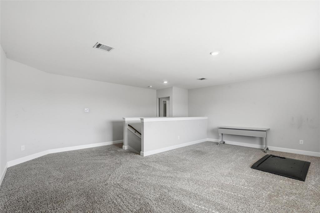 7612 Duck Bay Road Fort Worth, TX 76120 - Photo 13 of 32 a view of an empty room