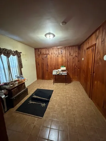 a kitchen with a cabinets and a stove top oven
