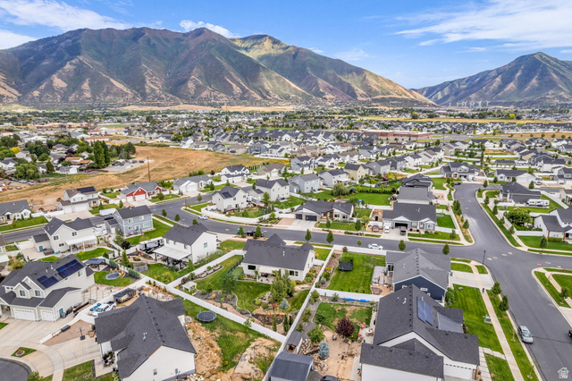 2454 West Jackson Street Mapleton, UT 84664 - Photo 59 of 63 Aerial view of residential area featuring a mountainous background