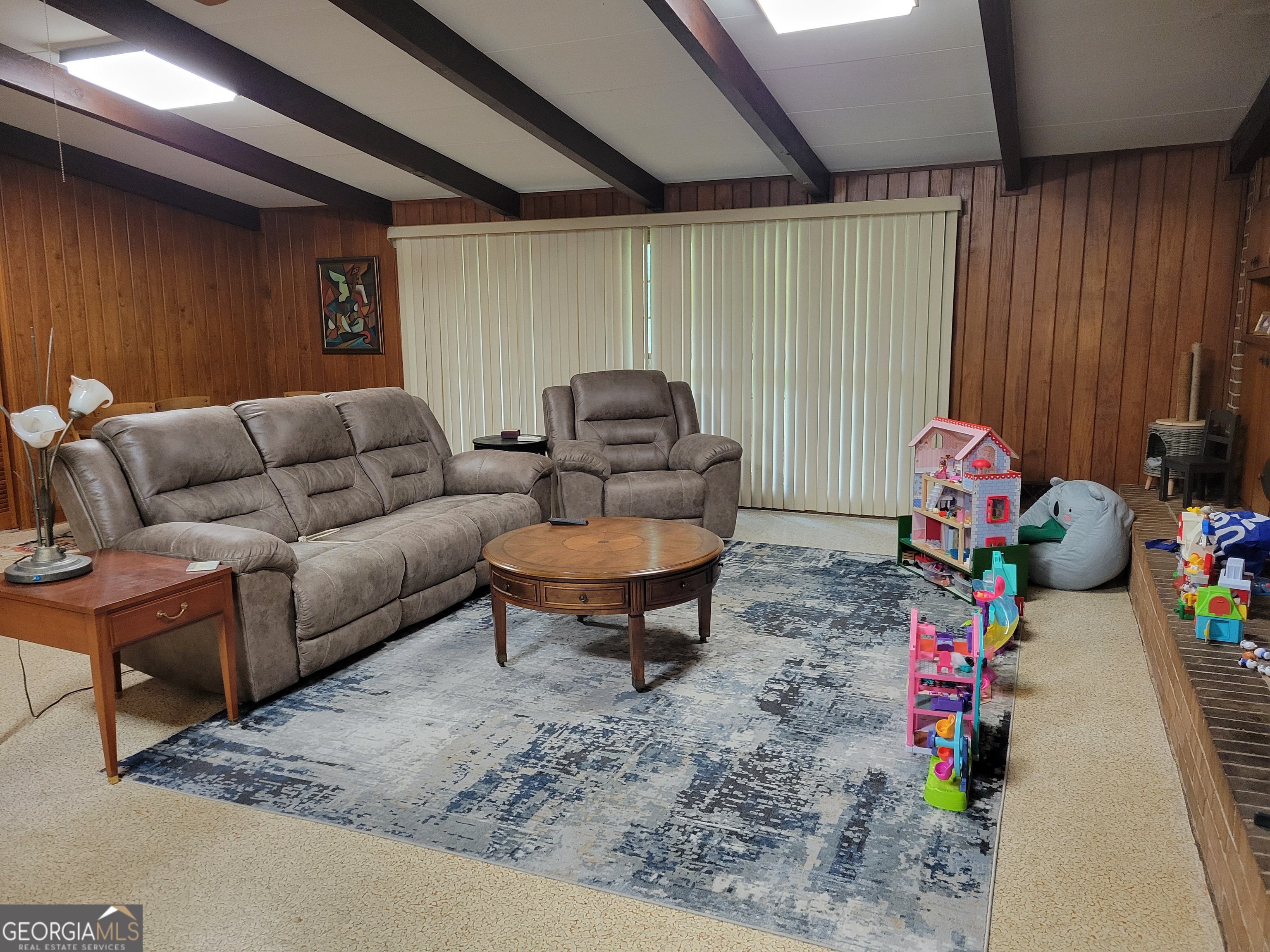 6190 Prestley Mill Road Douglasville, GA 30134 - Photo 4 of 12 a living room with furniture and a couch