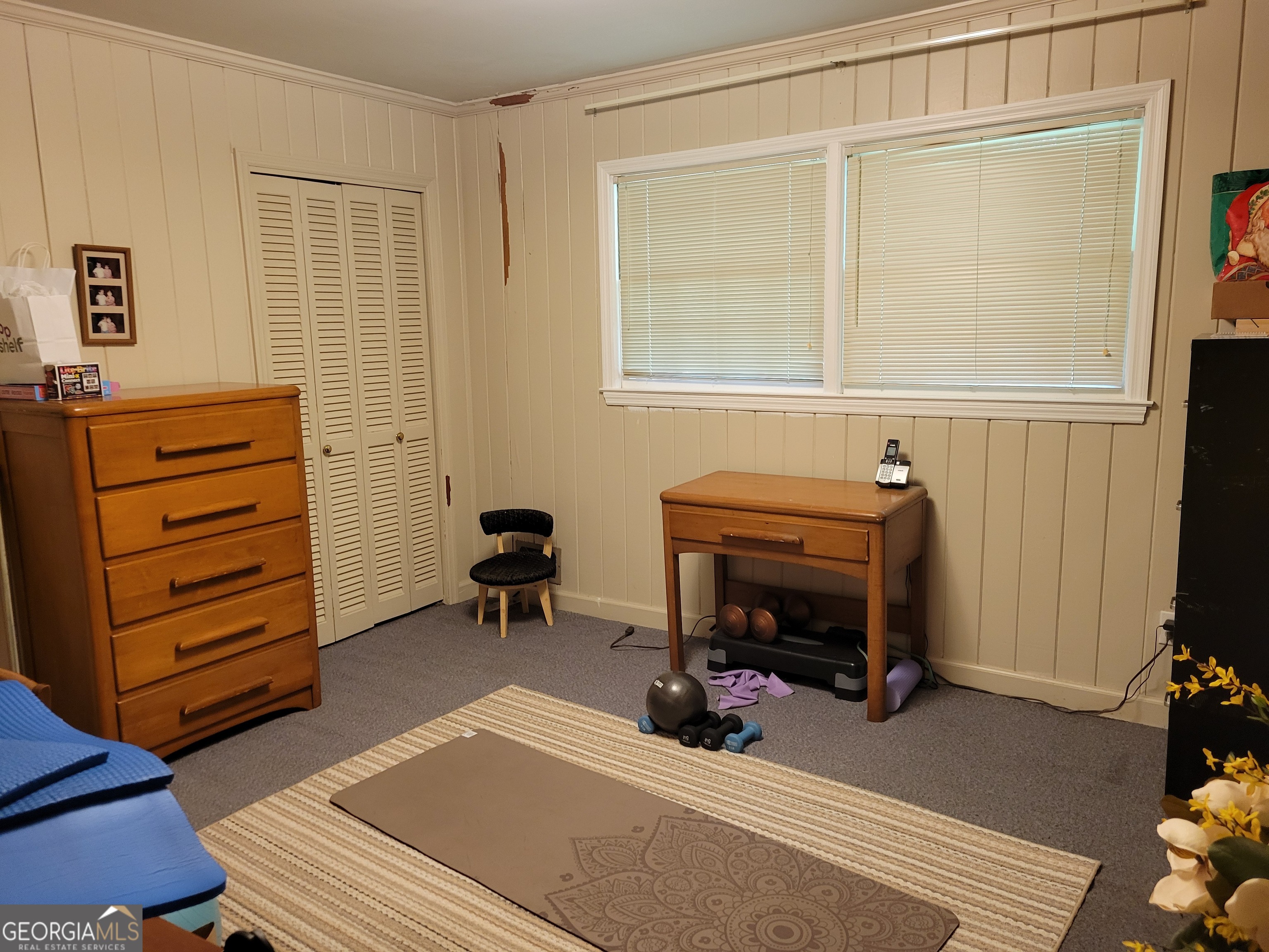 6190 Prestley Mill Road Douglasville, GA 30134 - Photo 8 of 12 a view of a workspace with furniture and a window