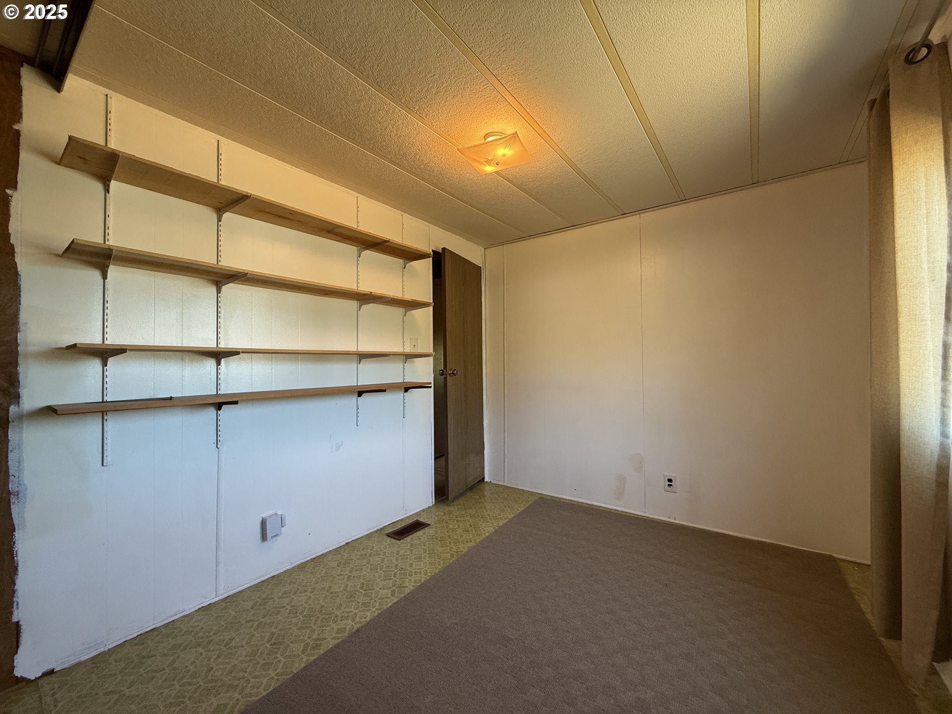 98620 Camellia Drive Brookings, OR 97415 - Photo 14 of 26 a view of a room with storage