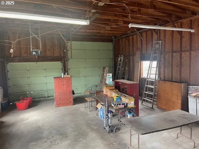 a bathroom with a shower and a sink