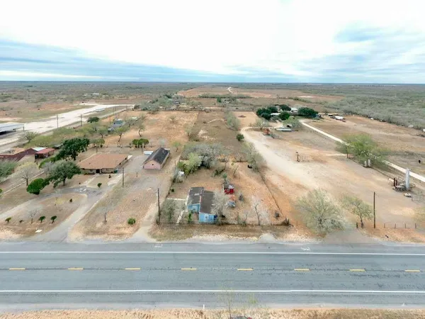 an aerial view of beach and ocean