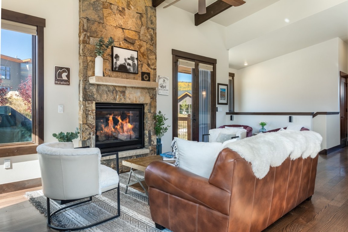 151 Moss Way Silverthorne, CO 80498 - Photo 11 of 31 a bedroom with a bed and a fireplace