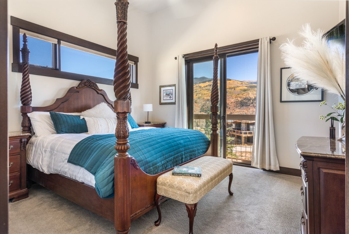 151 Moss Way Silverthorne, CO 80498 - Photo 13 of 31 a bedroom with a bed and a window